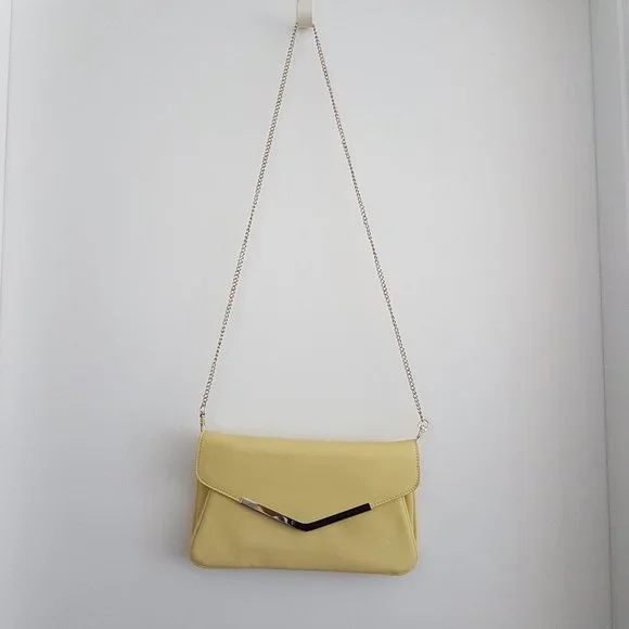 Pastel yellow clutch bag hotsell